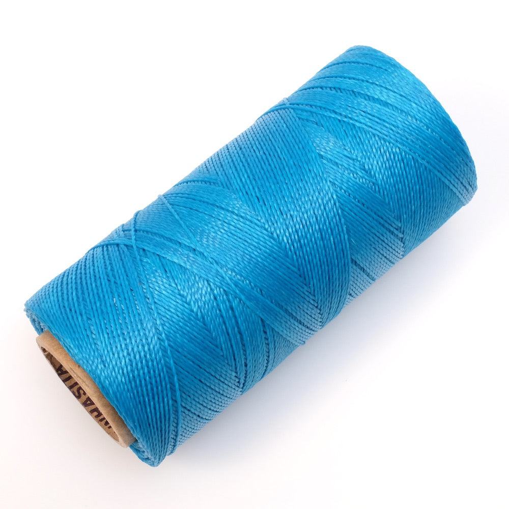 Bobine de fil ciré Linhasita 0,5mm pour micro macramé - Bleu Fluo