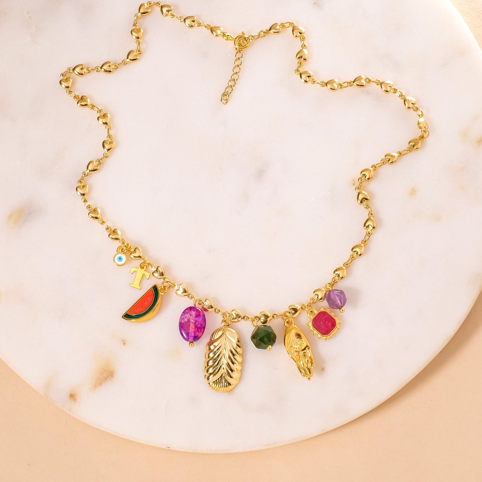 Chaine à petits maillons ovales torsadés dorée à l'or fin 24K.