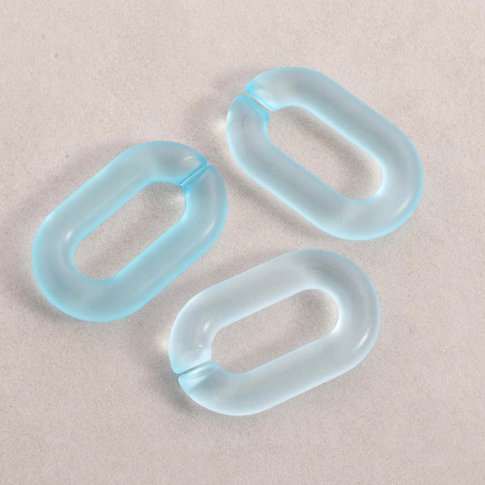 4 maillons ovale 31mm en acétate bleu clair transparent mat