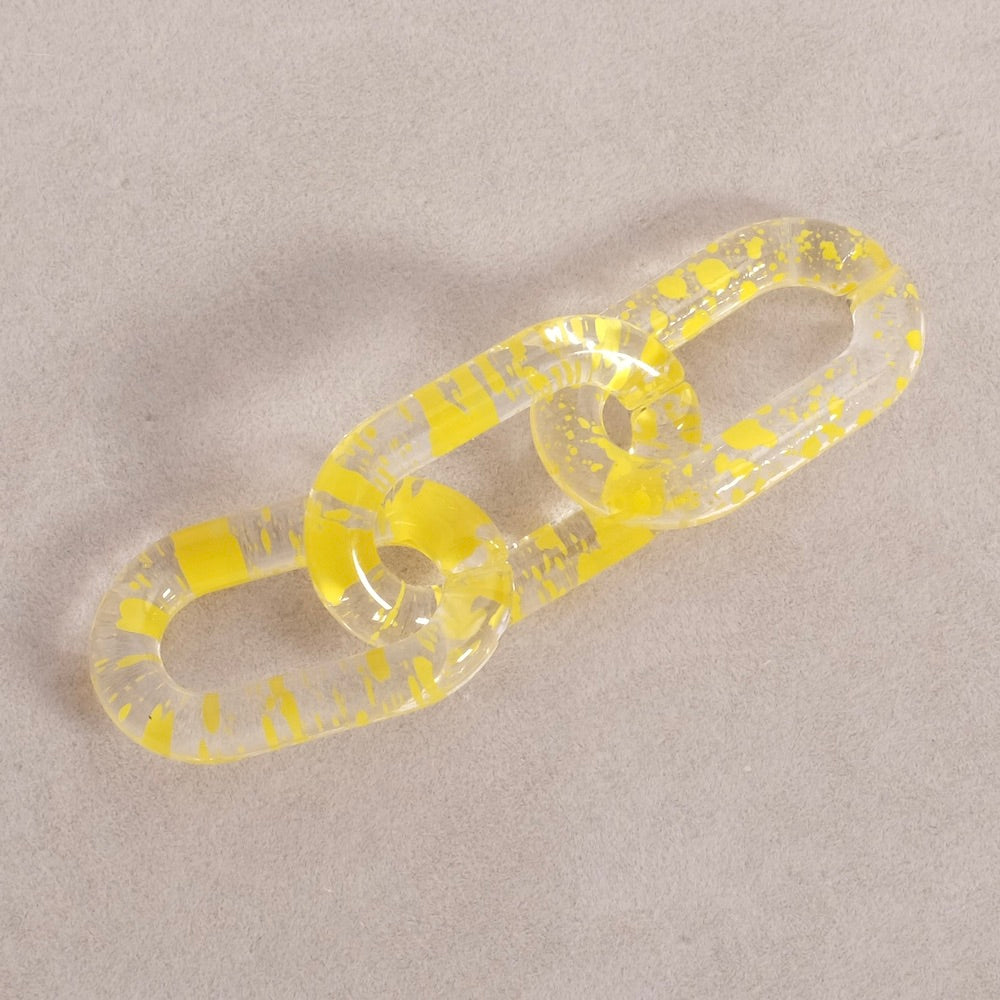 4 maillons ovale 27mm en acétate transparent moucheté jaune