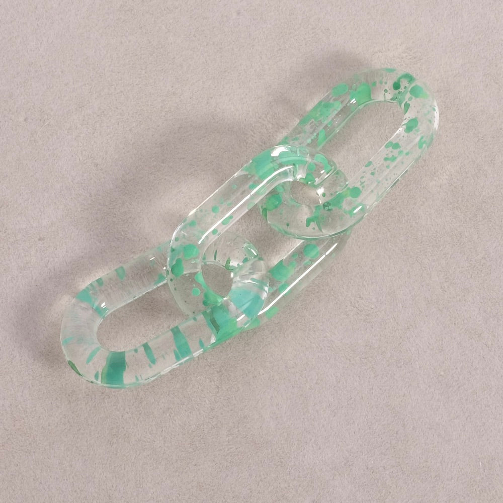 4 maillons ovale 27mm en acétate transparent moucheté vert