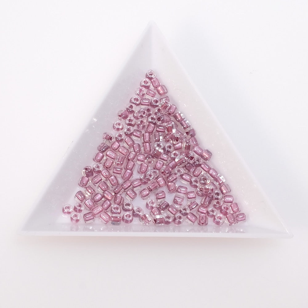 5 grammes de perles Miyuki triangles 8/0  N°1114 transparent intérieur lie de vin