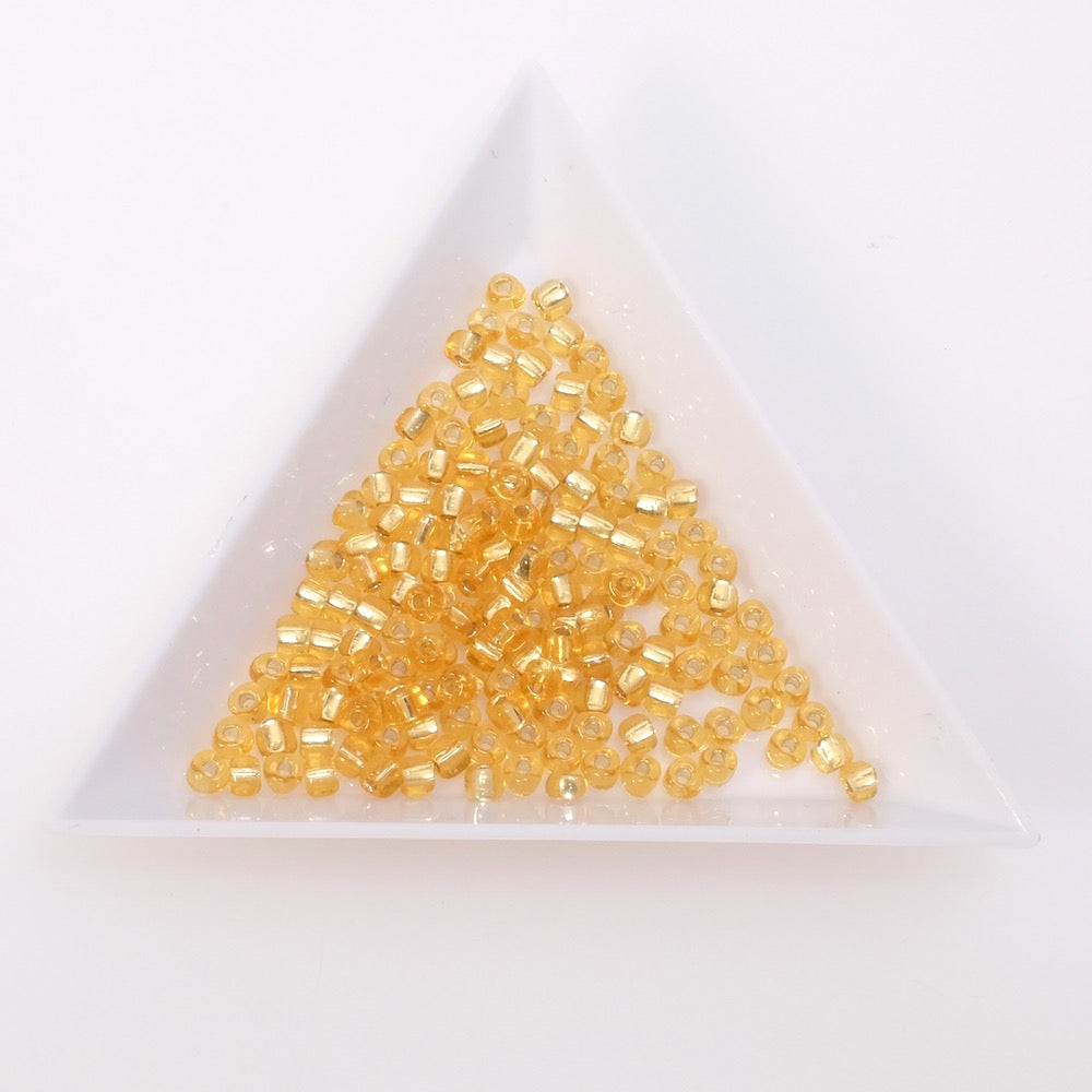 5 grammes de perles Miyuki triangles 8/0  N°1102 jaune intérieur argent