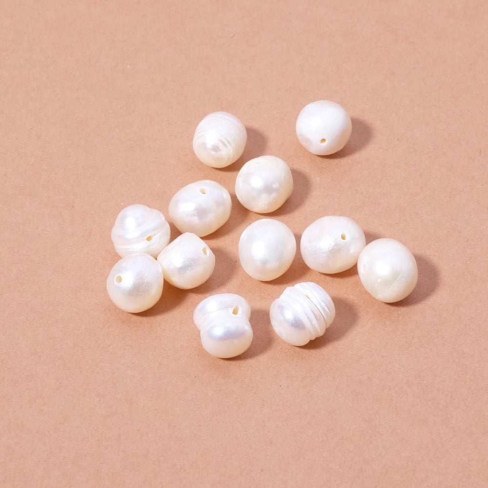 10 perles ovales irrégulières de Nacre naturelle