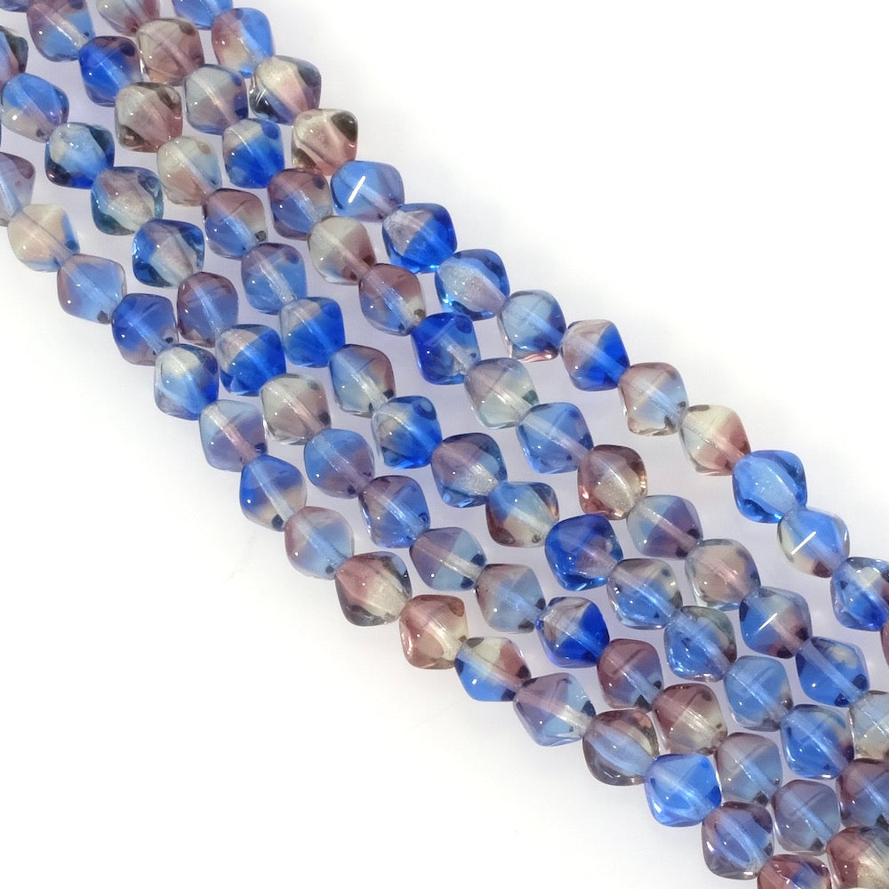 Fil de perles de Bohème toupies facettées 6mm bleu violet transparent