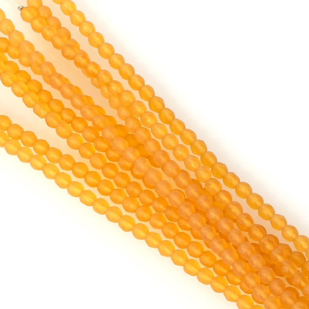 Fil de perles de Bohème rondes facettées 4mm orange miel mat