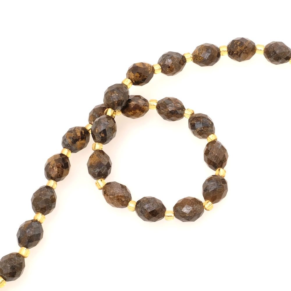 Fil de Perles naturelle ovale facettée 7 x 8mm en en Bronzite