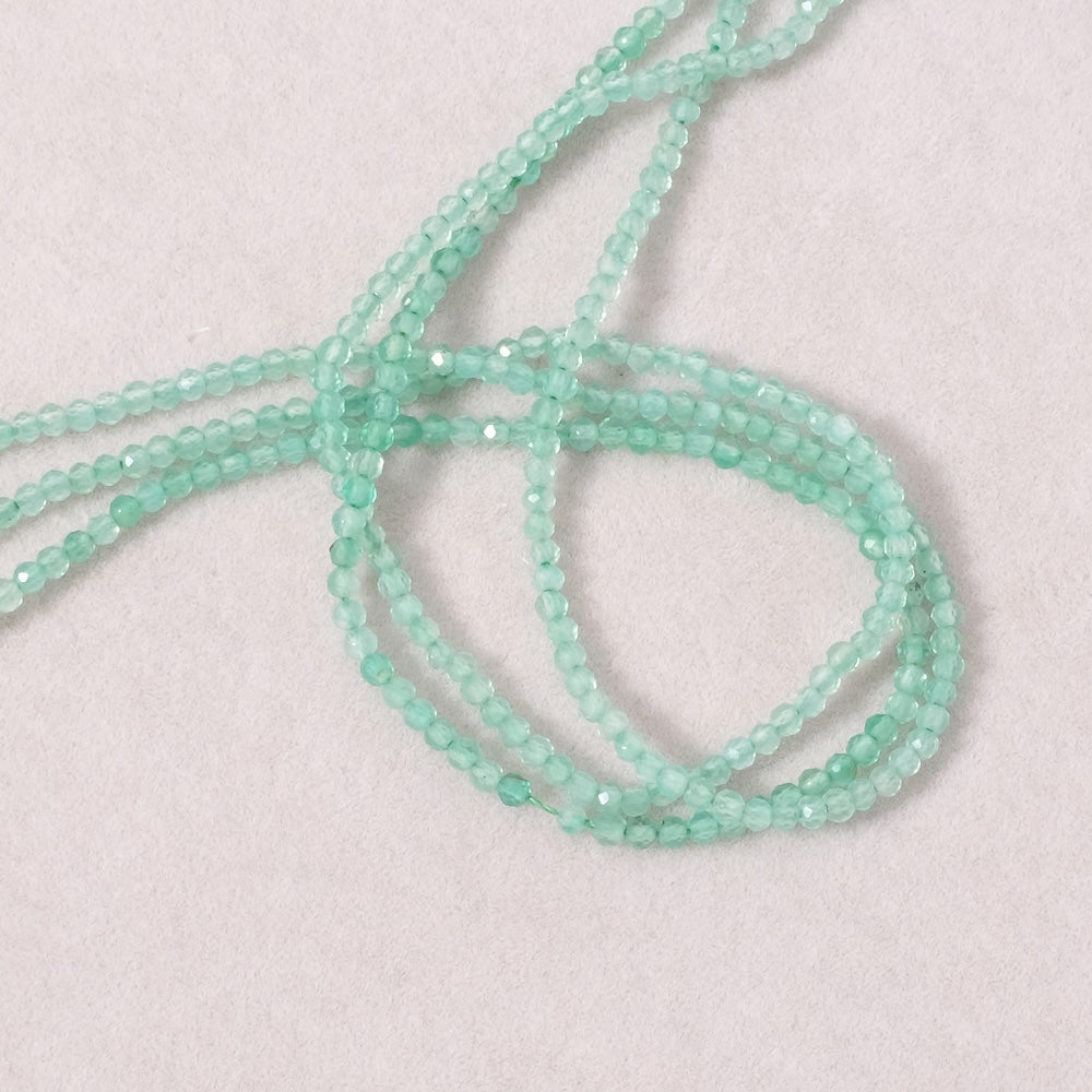 Fil de perle 2mm facettée en pierre naturelle Onyx vert