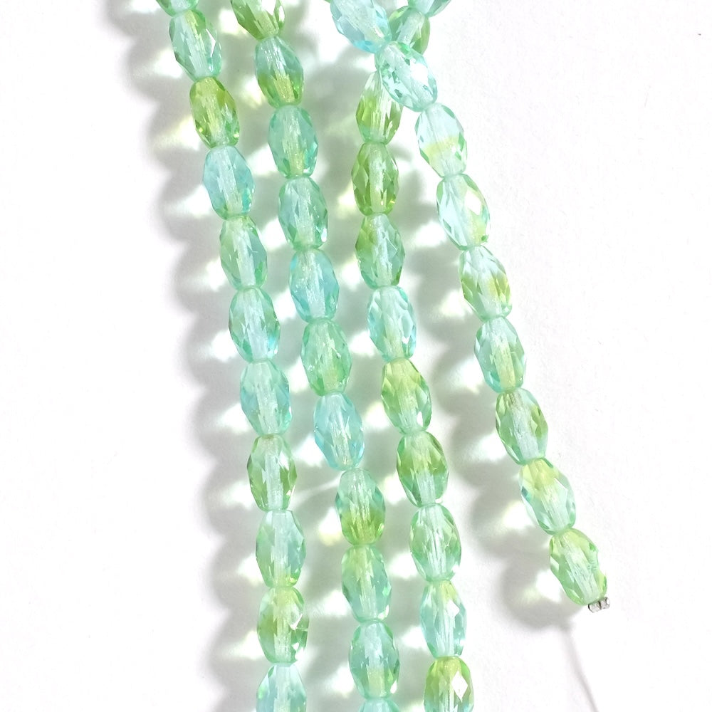 Fil de perles de Bohème Olives facettées 9x6mm Vert transparent