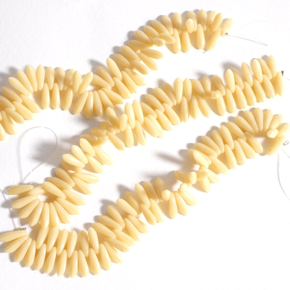 Fil de perles de Bohème Pointes beige 11mm