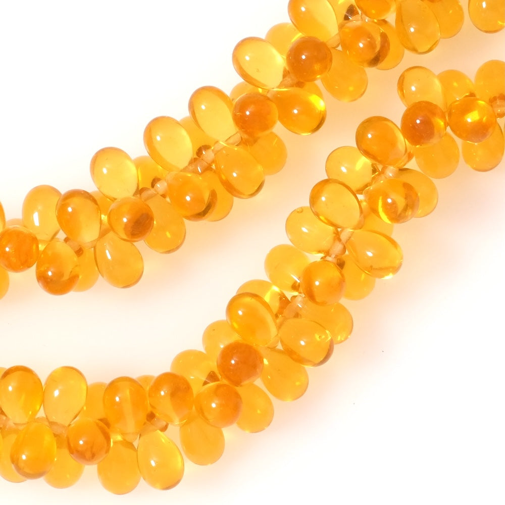Fil de perles de Bohème gouttes 6x9mm Orange clair transparent
