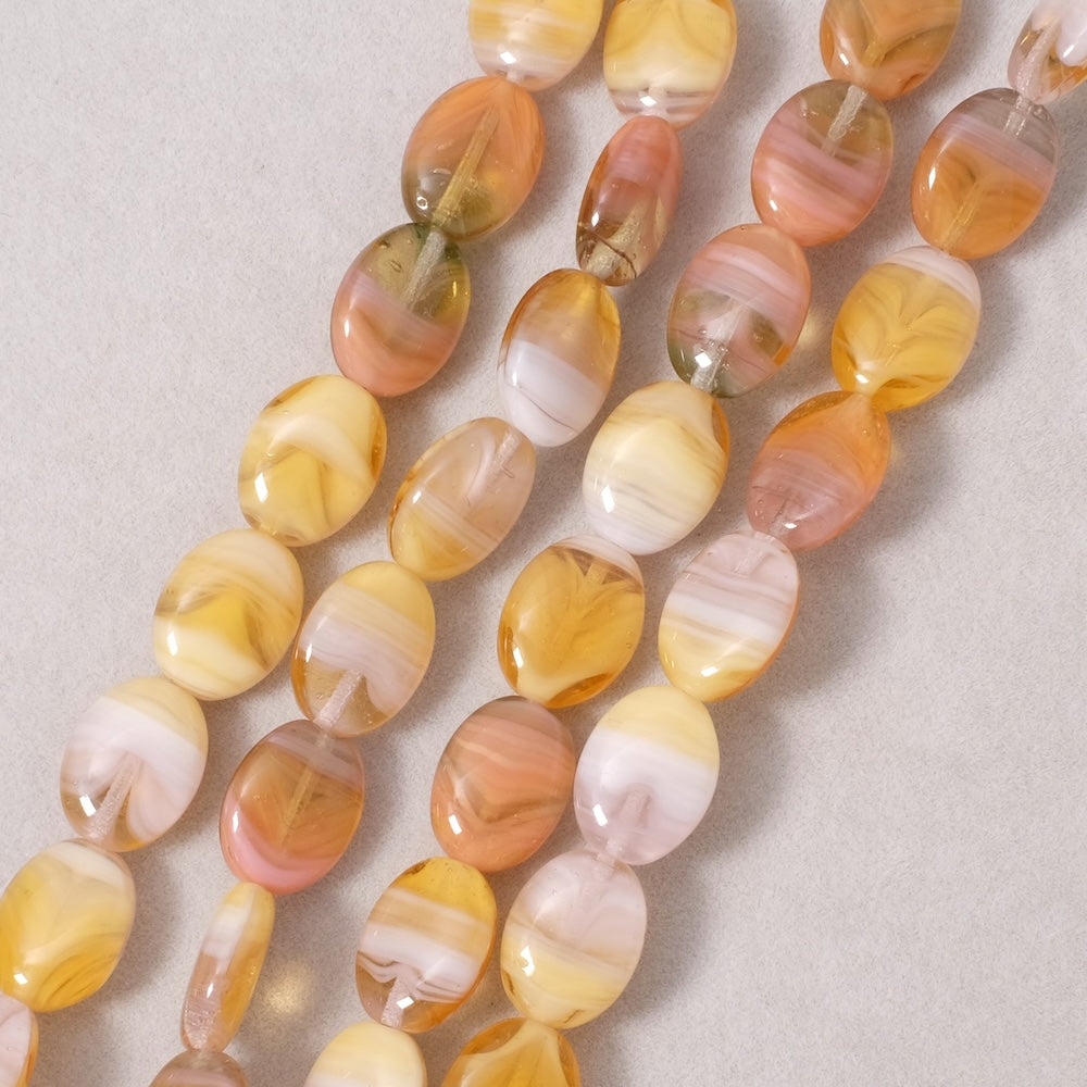 Fil de perles de Bohème ovales 12x9mm nuances jaune effet marbré