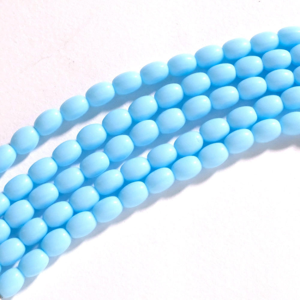 Fil de perles de Bohème ovales 8x6mm Bleu clair opaque