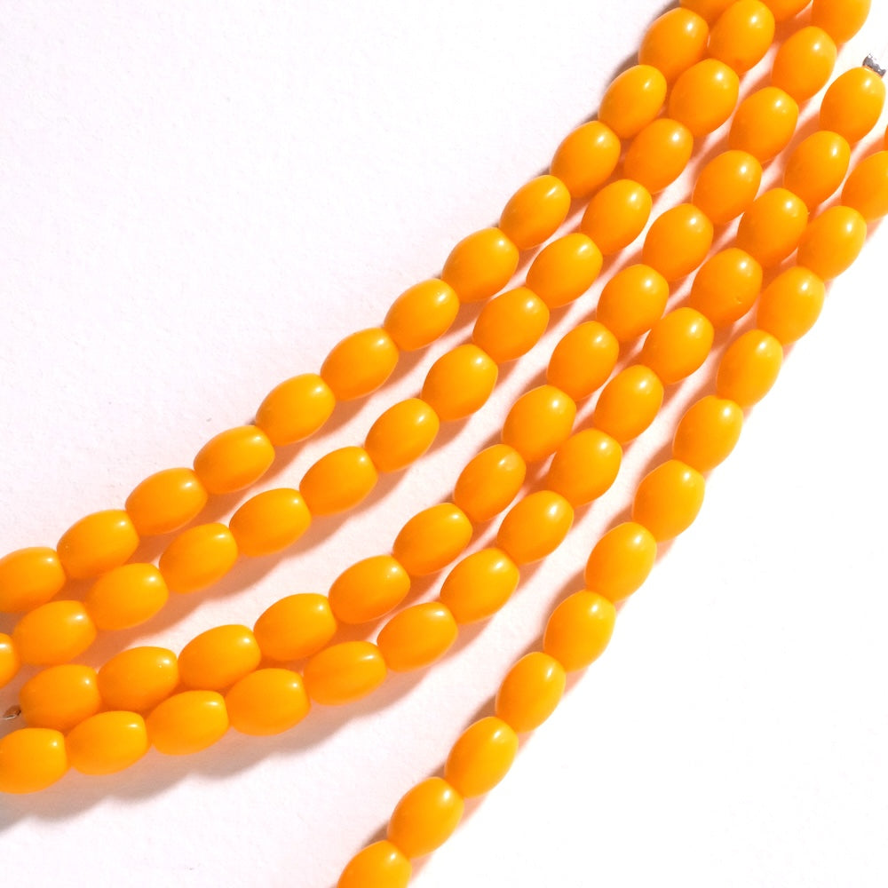Fil de perles de Bohème ovales 8x6mm Orange opaque