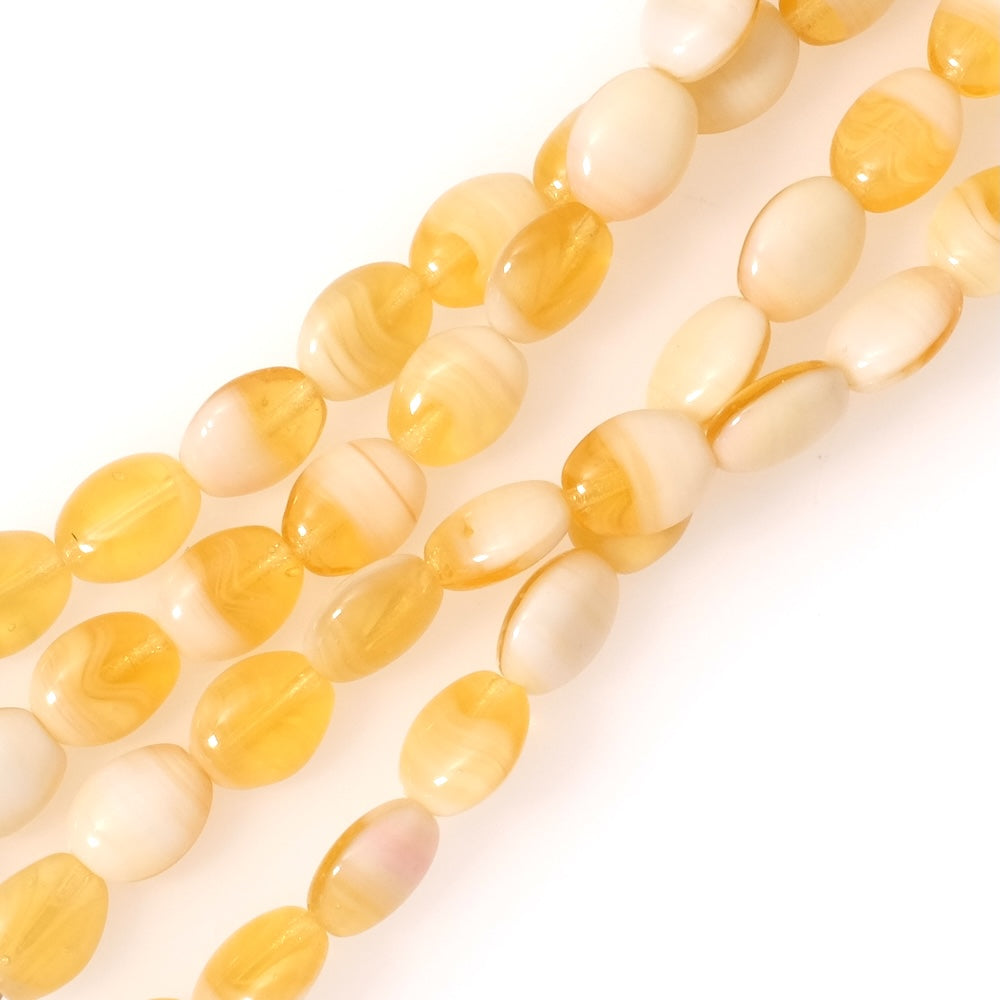 Fil de perles de Bohème ovales 9x7mm nuances de jaune et crème