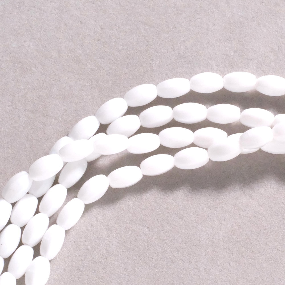 Fil de perles de Bohème ovales facettées 9x6mm Blanc opaque