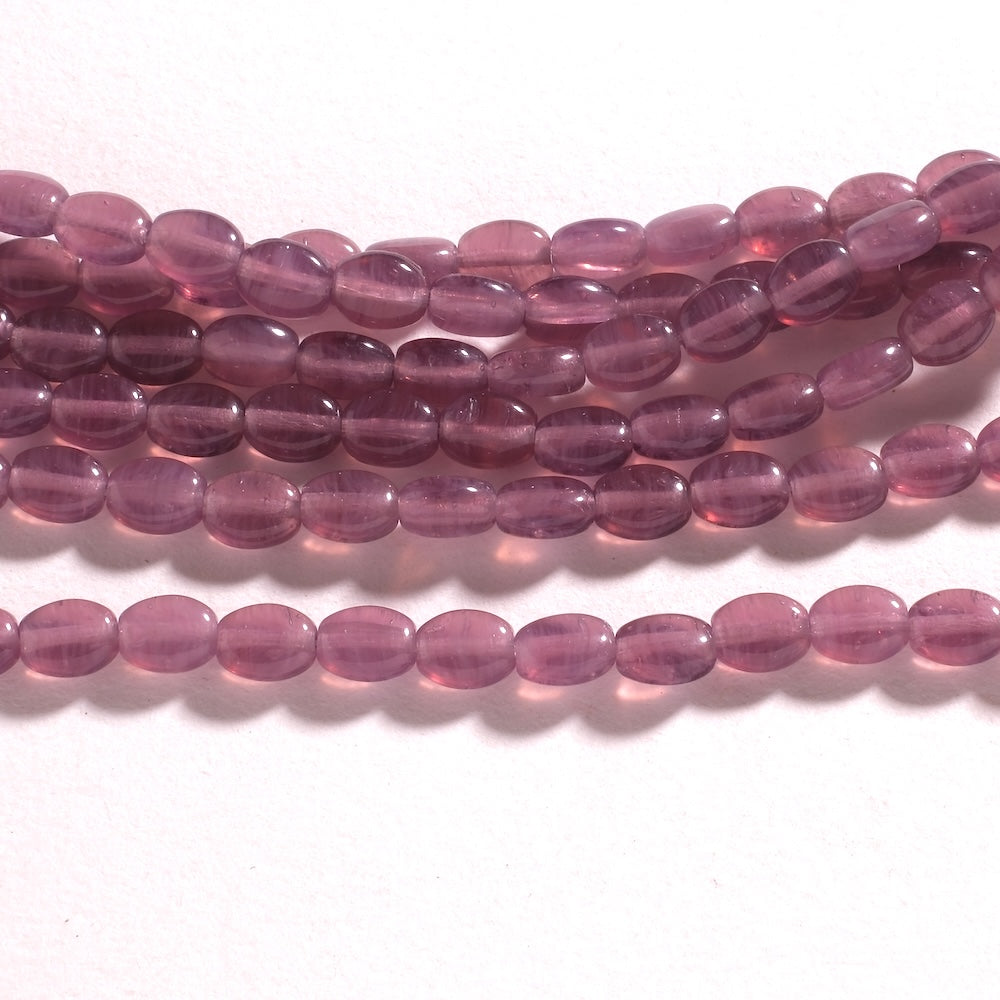 Fil de perles de Bohème ovales plates 9 x 7 mm en verre violet transparent