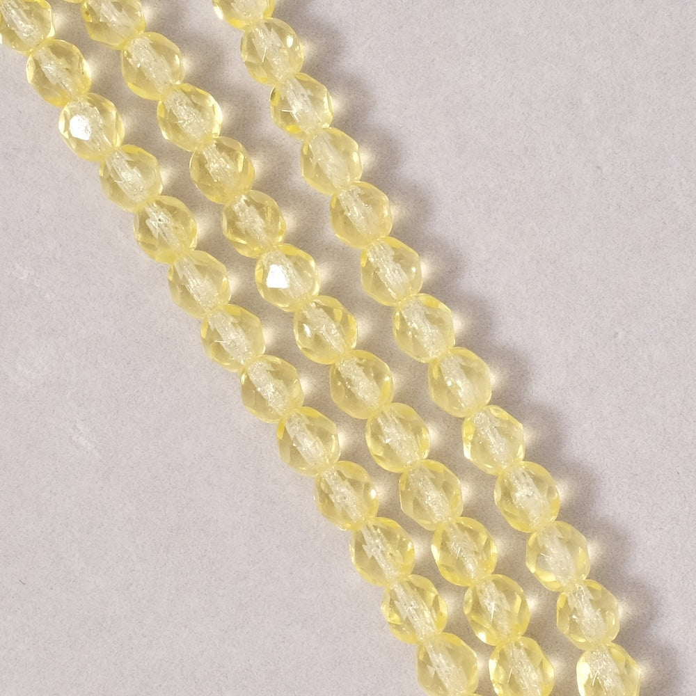 Fil de perles de Bohème rondes facettées 6mm jaune pastel transparent