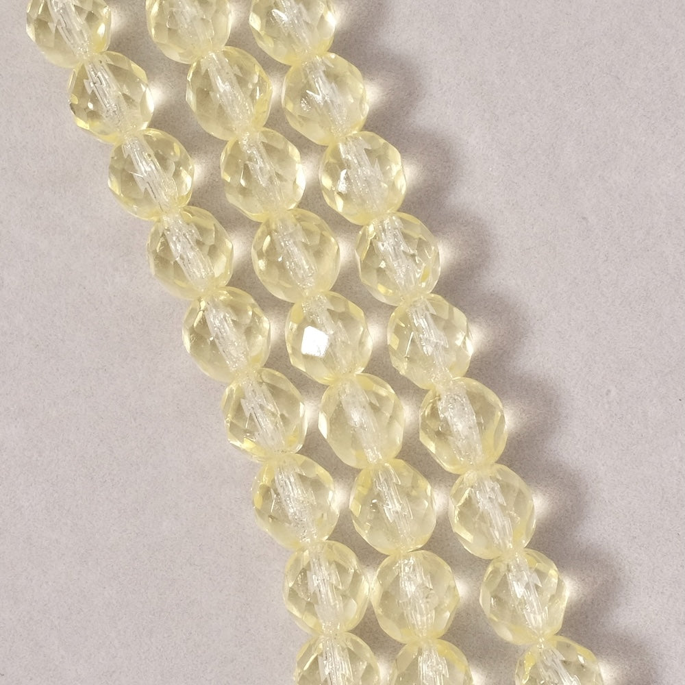 Fil de perles de Bohème rondes facettées 8mm jaune pastel transparent