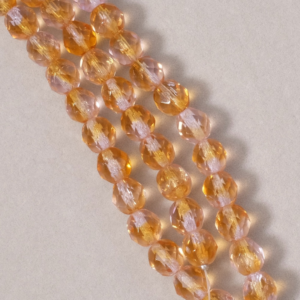 Fil de perles de Bohème rondes facettées 8mm orange clair et transparent