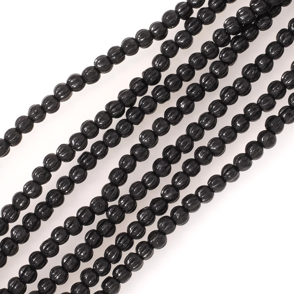 Fil de perles de Bohème rondes striées 3mm noir opaque