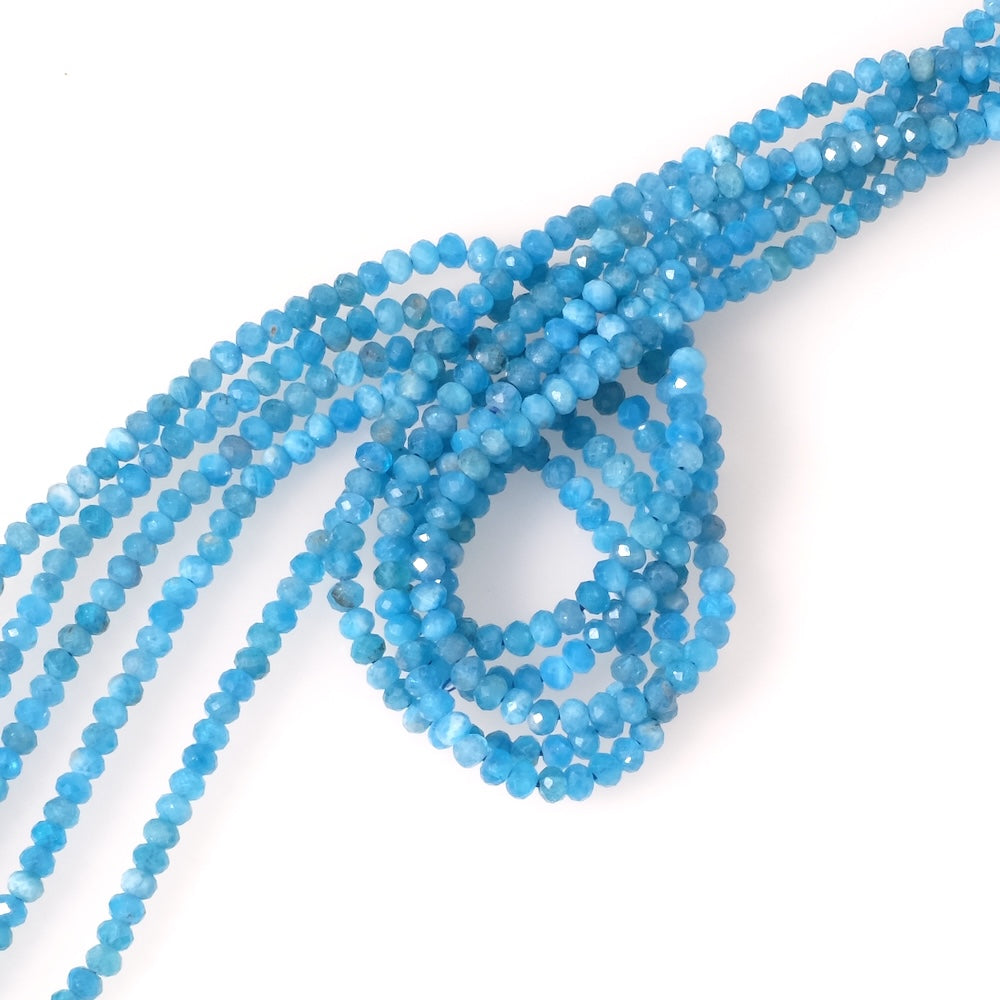 Fil de perles en pierres naturelles donuts facettées 3x2mm en Apatite