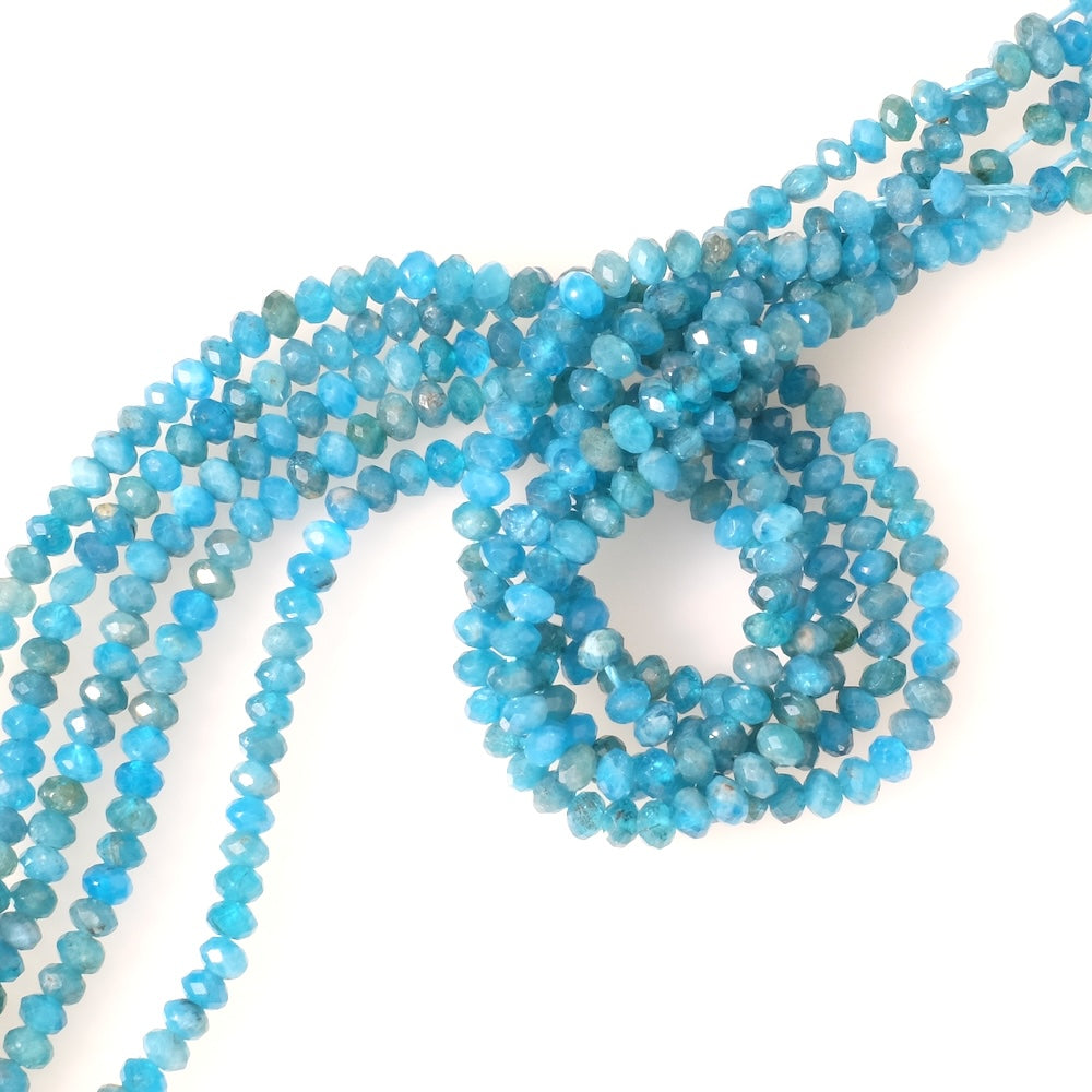 Fil de perles en pierres naturelles donuts facettées 4x3mm en Apatite