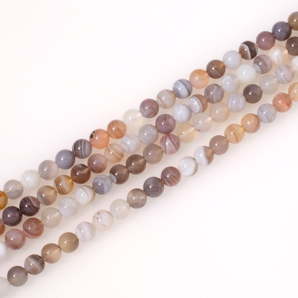 Fil de perles en pierres naturelles ronde 6mm en Agate Botswana