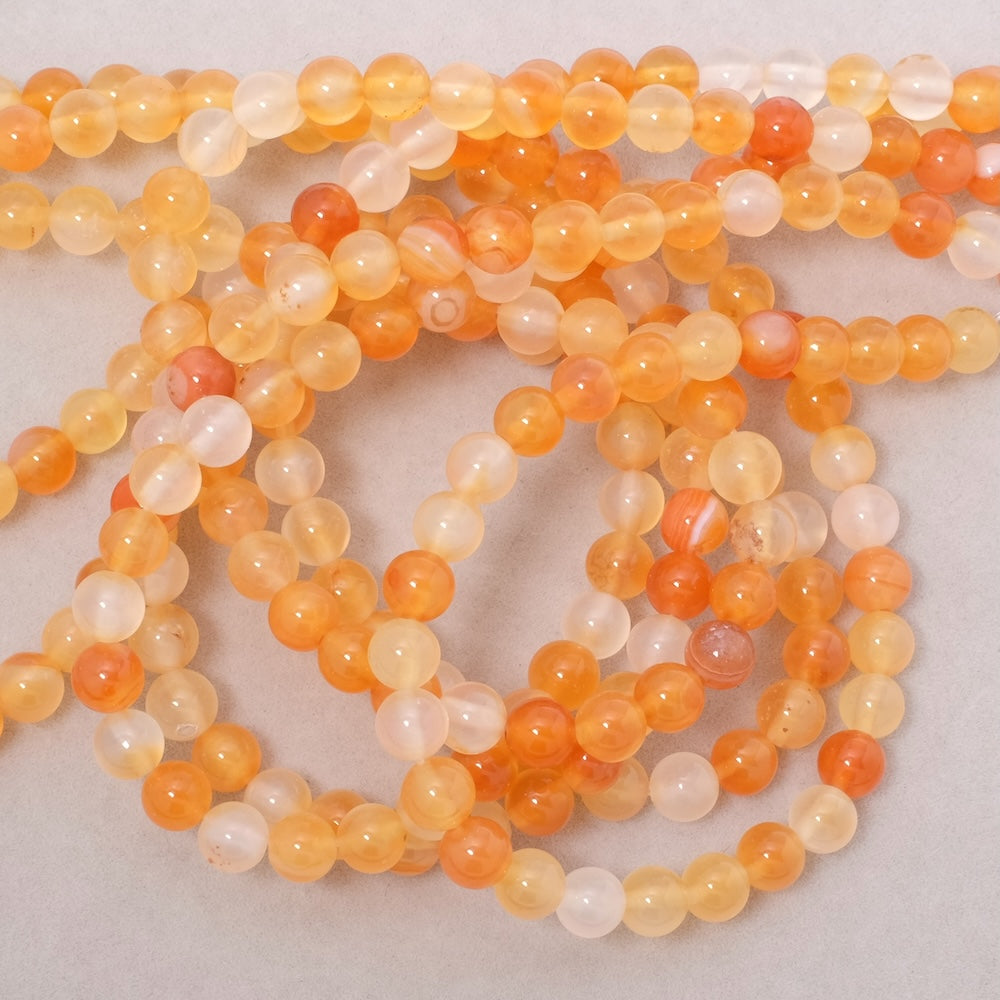 Fil de perles naturelles rondes 6mm en Cornaline