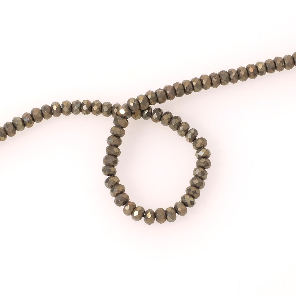 Fil de perles naturelles donuts facettées 4x3mm en Pyrite