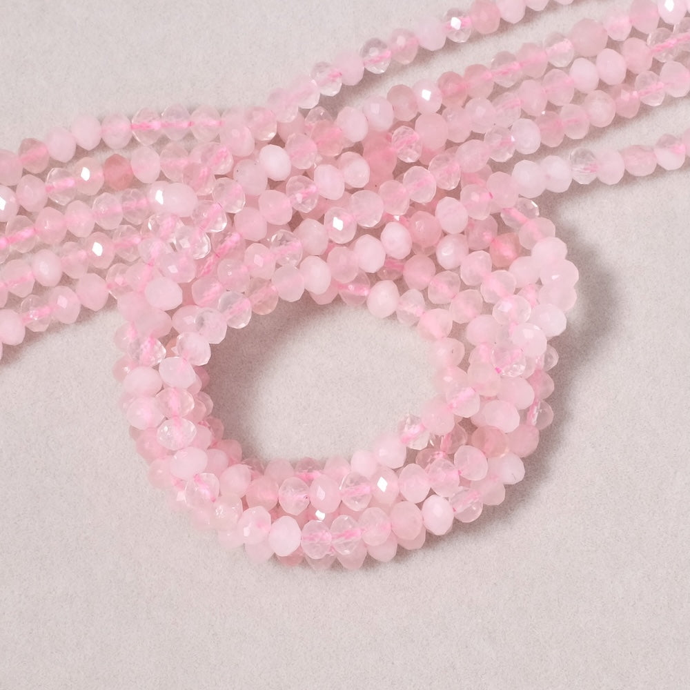 Fil de perles naturelles donuts facettés 4x3mm en Quartz rose