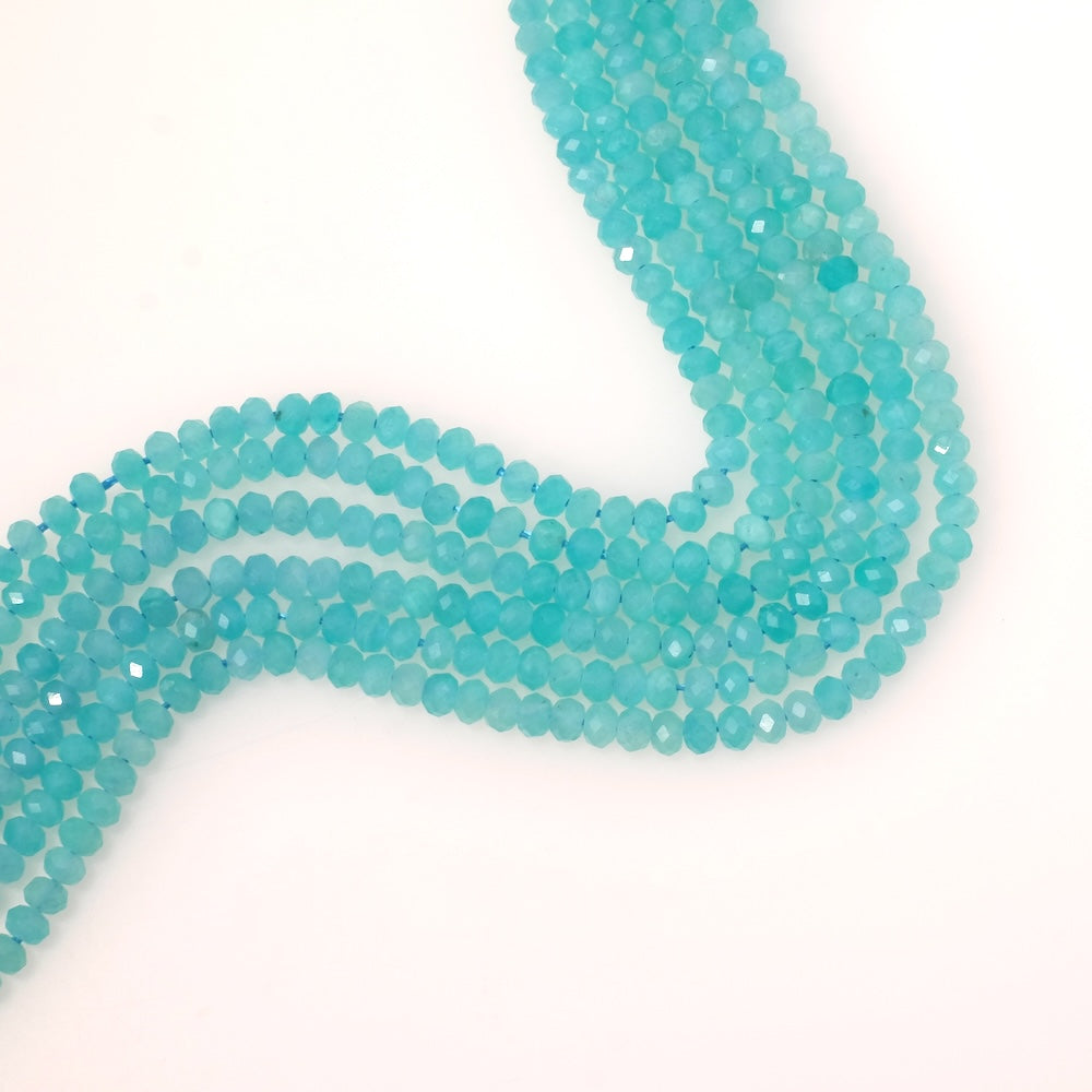 Fil de perles naturelles donuts facettés 4x3mm en Amazonite