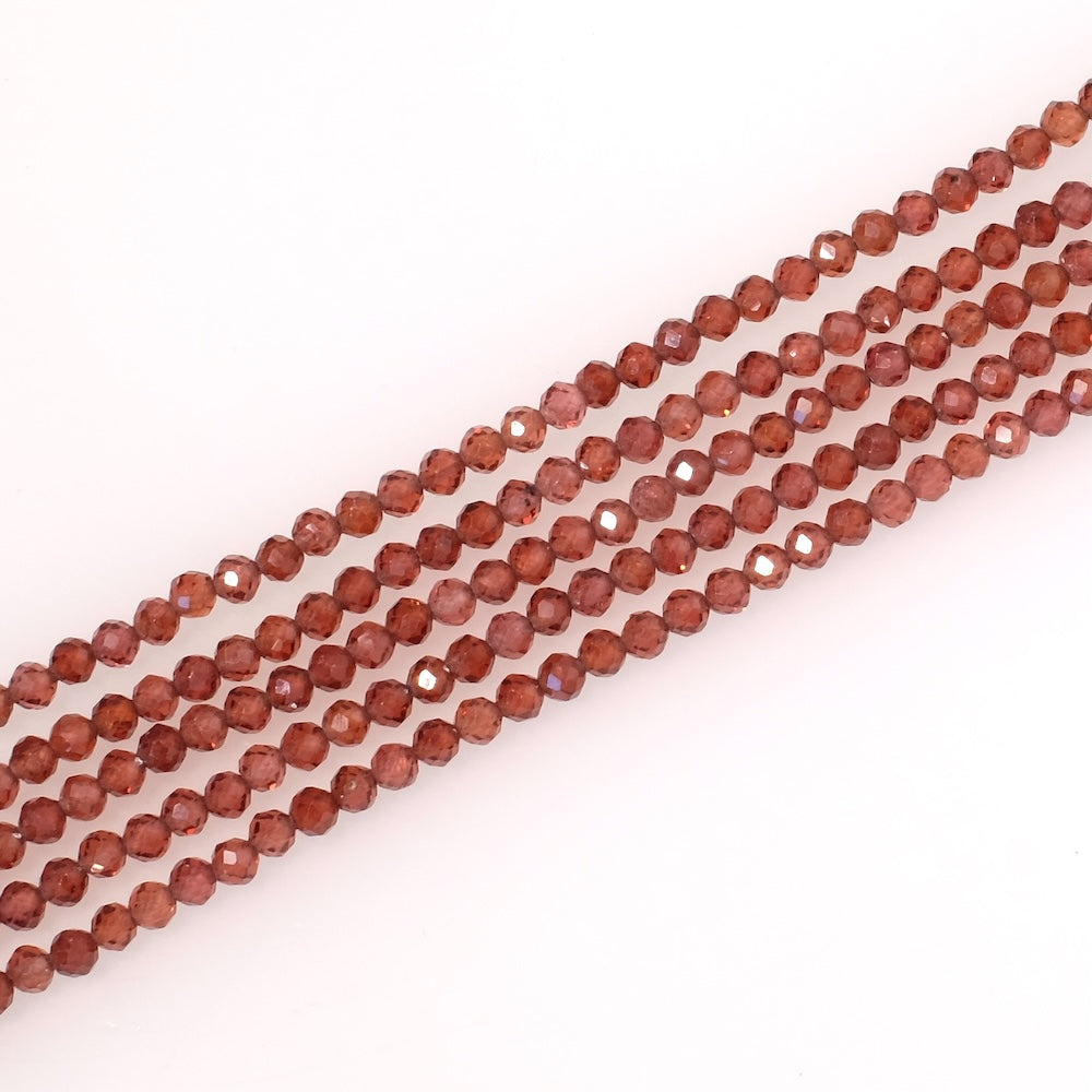 Fil de perles naturelles facettées 3mm en Grenat Hessonite
