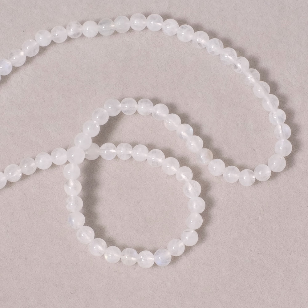 Fil de perles naturelles rondes 4mm en Pierre de lune Rainbow