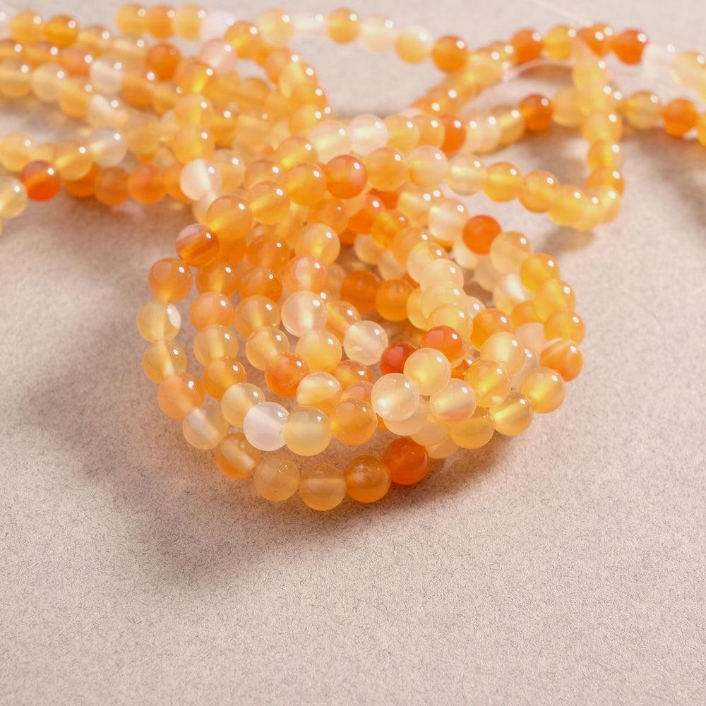 Fil de perles naturelles rondes 6mm en Cornaline