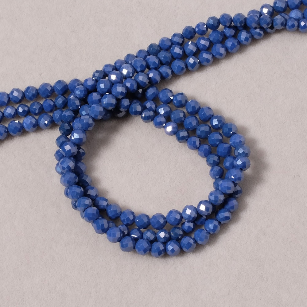 Fil de perles ronde facettée 3,4mm en Oxyde de Zirconium ou Zircone cubique Bleu