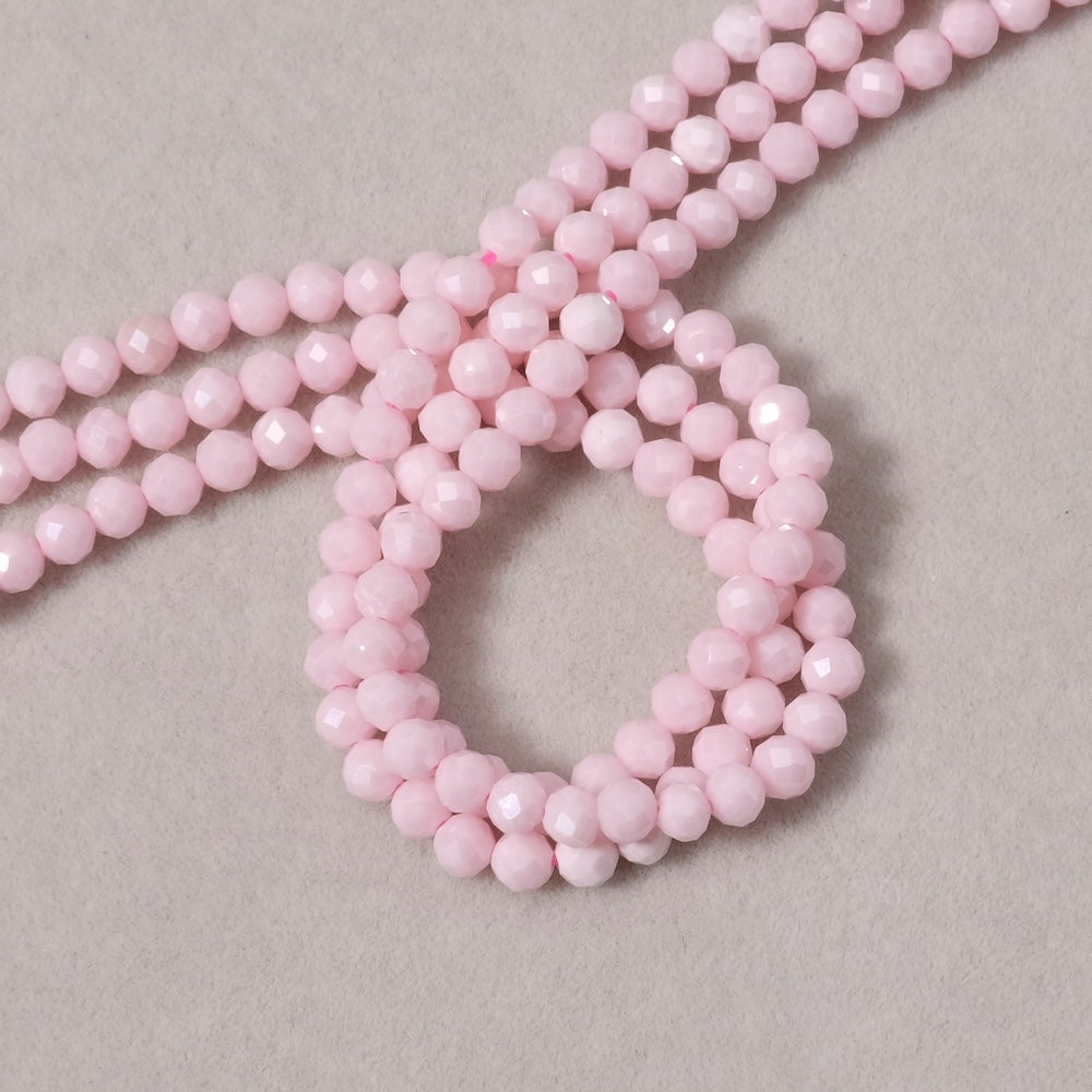Fil de perles ronde facettée 3,4mm en Oxyde de Zirconium ou Zircone cubique rose pastel