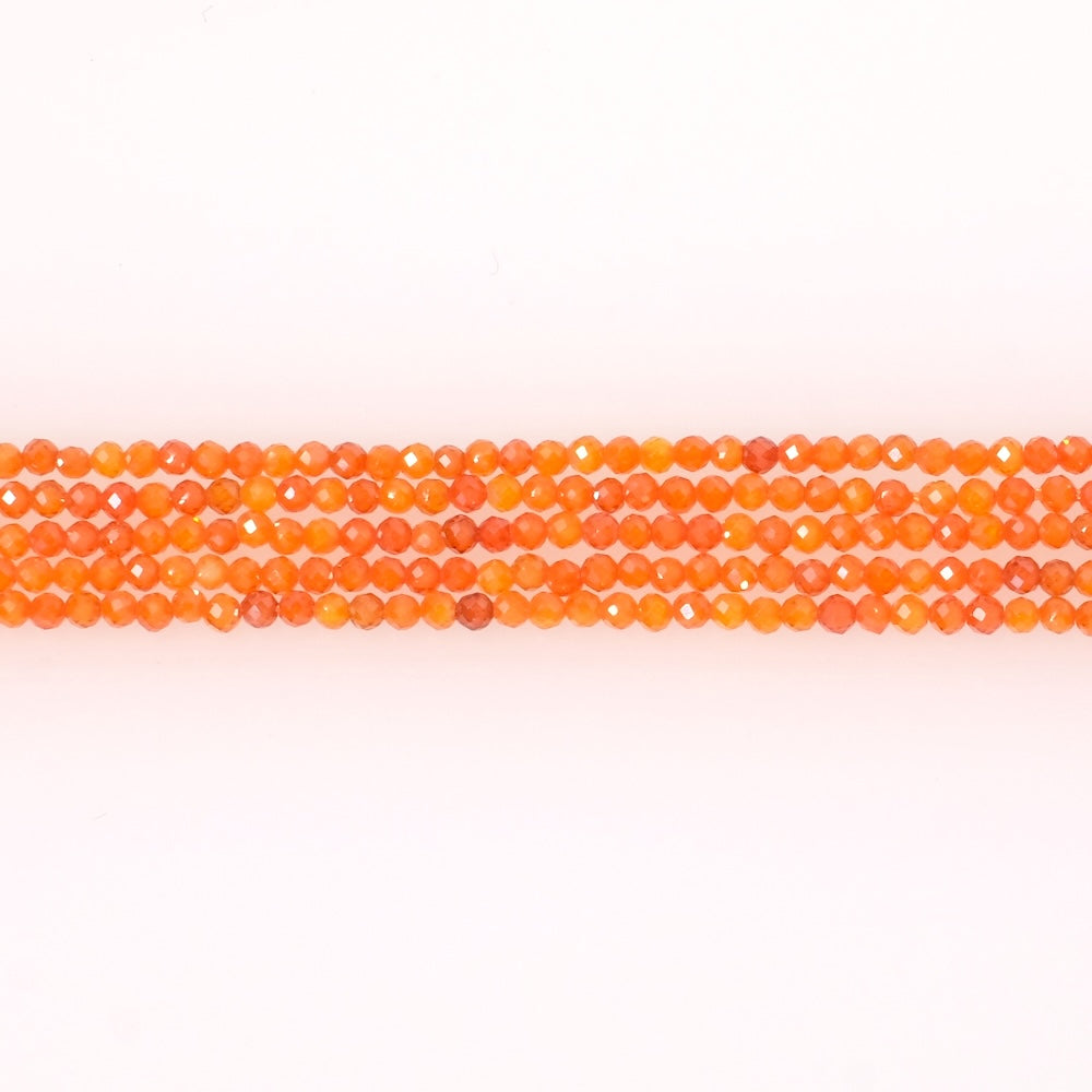 Fil de perles ronde facettée 2mm en Oxyde de Zirconium orange ou Zircone cubique