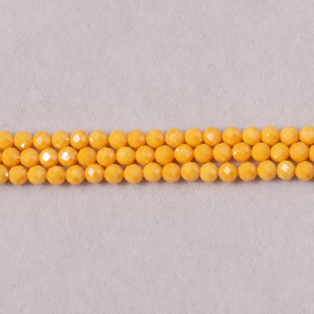 Fil de perles ronde facettée 3,4mm en Oxyde de Zirconium ou Zircone cubique orange