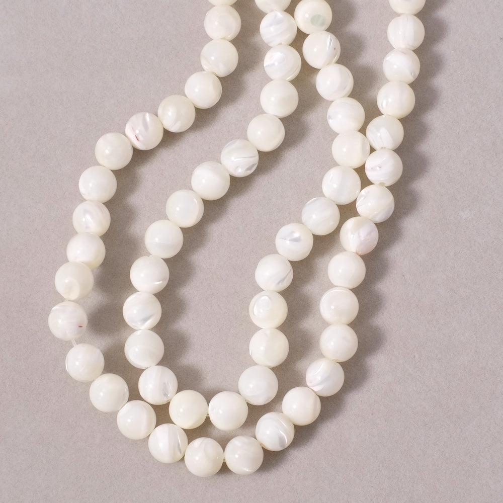 6 perles rondes 8mm de Nacre blanche