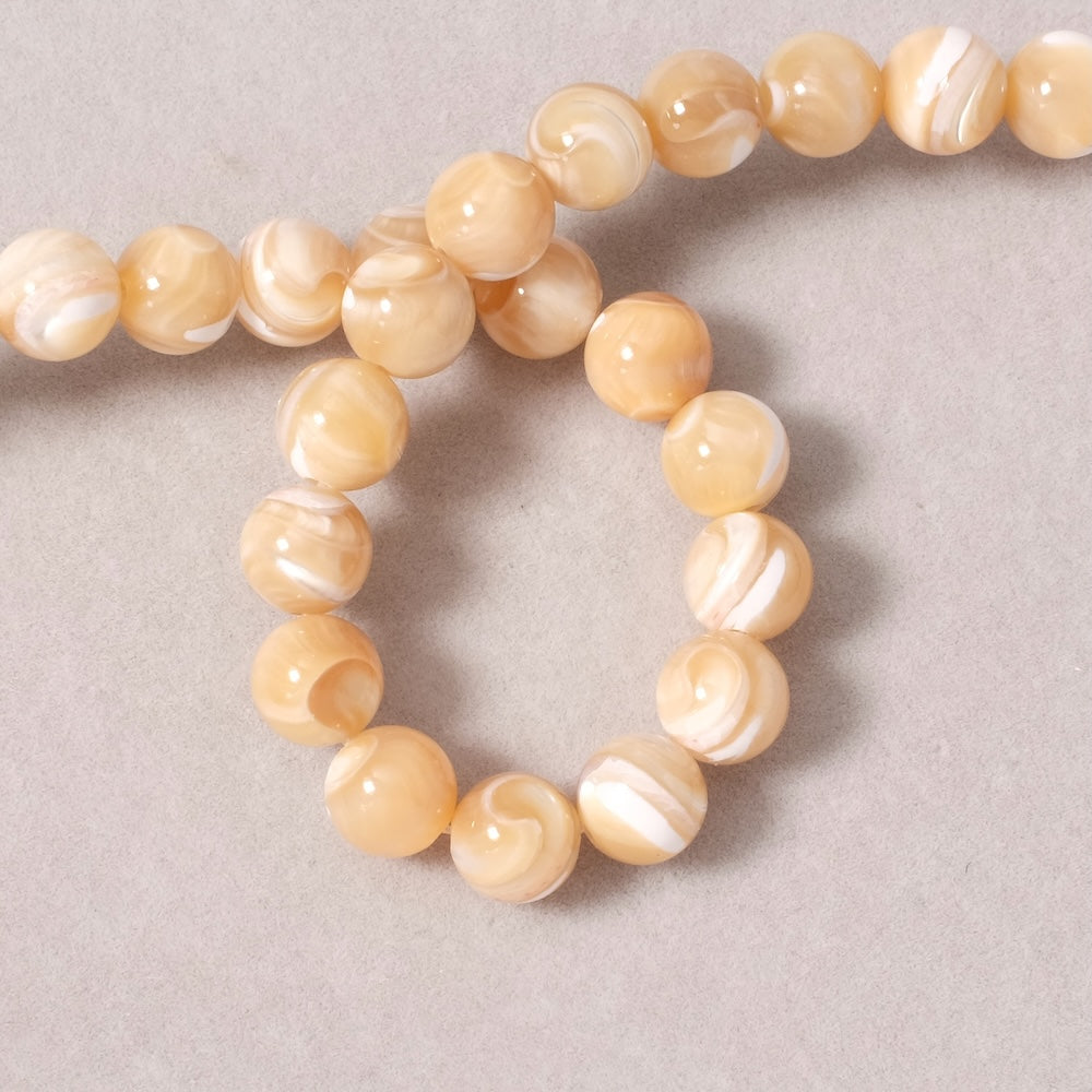 Fil de perles rondes 8mm en Nacre naturelle beige