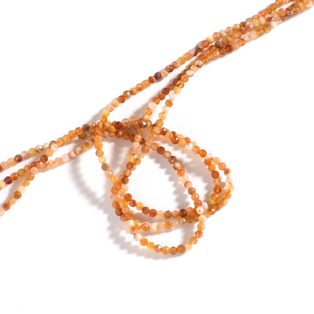 Fil de perles rondes facettées 2,5 mm — opale de feu