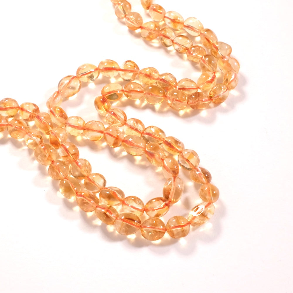 Fil de perles rondes irrégulières — citrine 39 cm