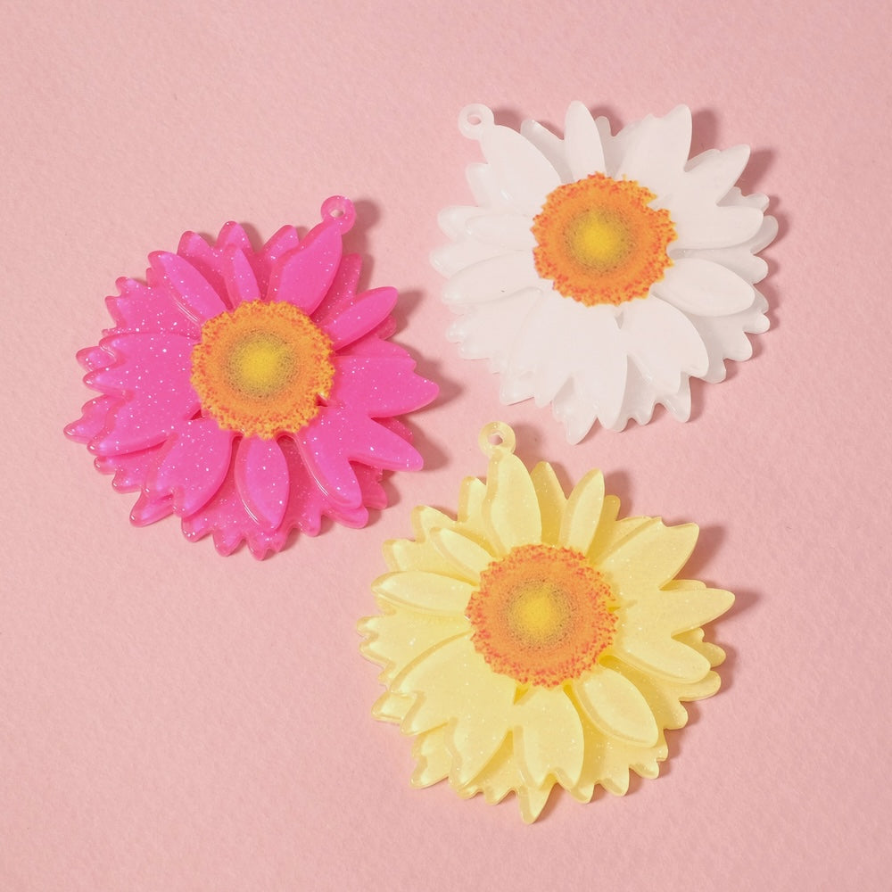 Pendentif fleur marguerite jaune pastel en acétate pailleté