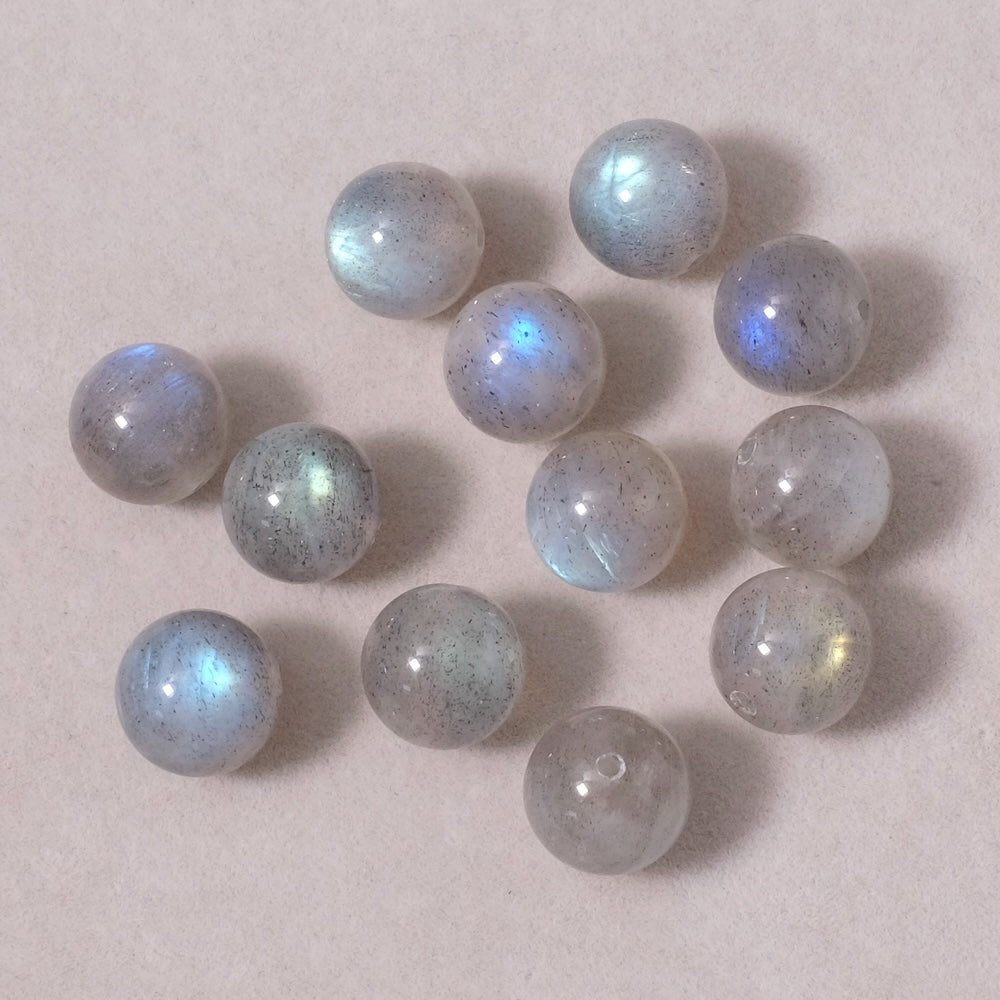 Plaque de labradorite polie - Madame Gemme Plaque de labradorite polie - Madame Gemme