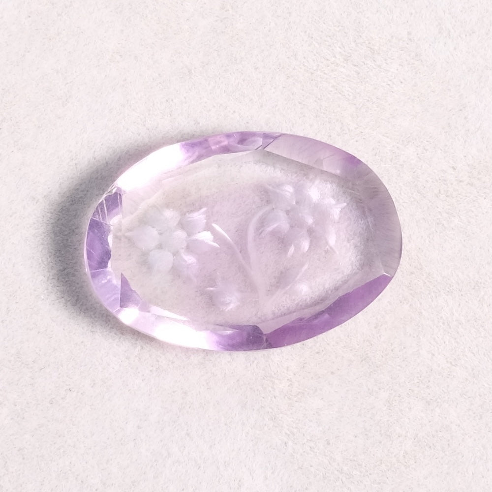 Pierre facettée gravée motif floral 20 x 14mm en Améthyste