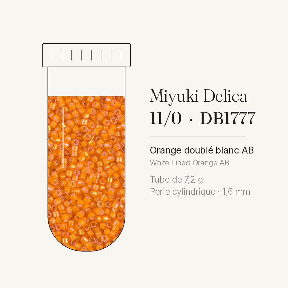 Tube de 7,2 g de perles Miyuki Delica 11/0 DB1777 orange doublé blanc AB