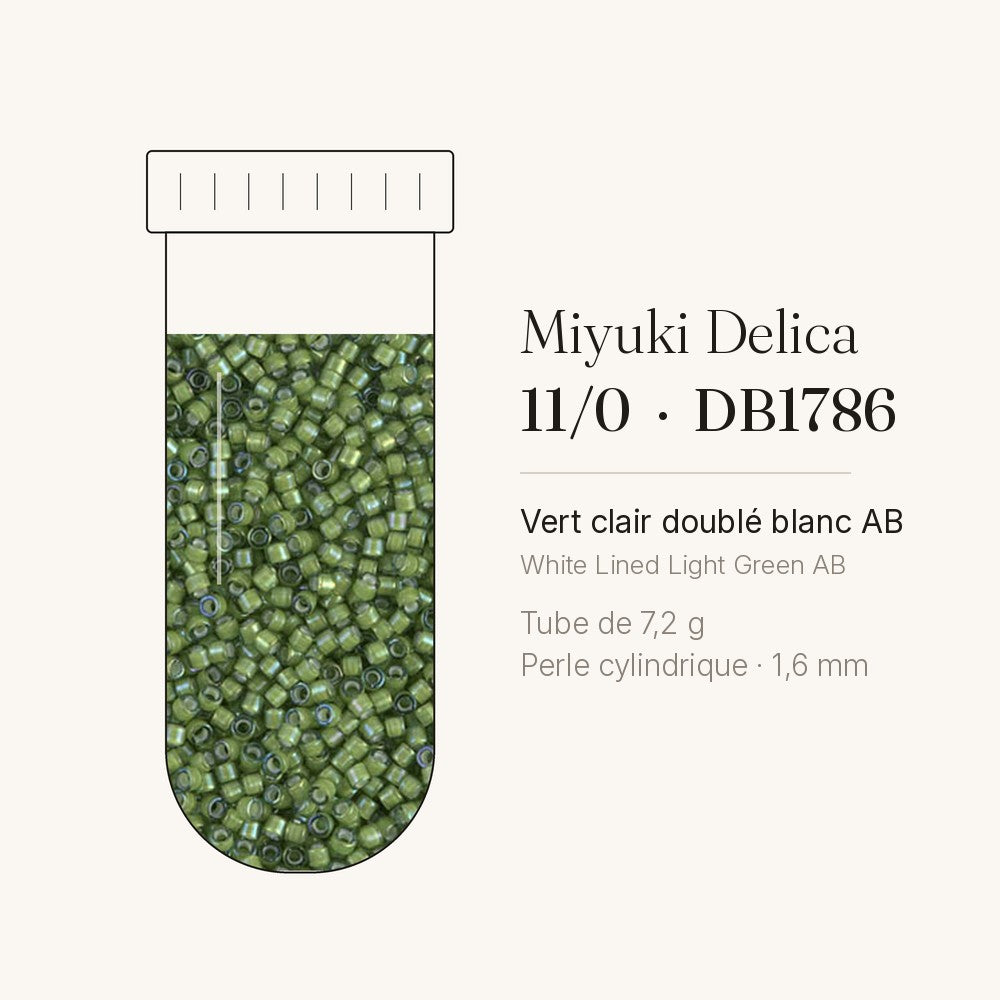 Tube de 7,2 g de perles Miyuki Delica 11/0 DB1786 vert clair doublé blanc AB