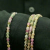 Vidéo du fil de perles en tourmaline multicolore facettée 4 mm, tons doux rose, pêche et vert tendre