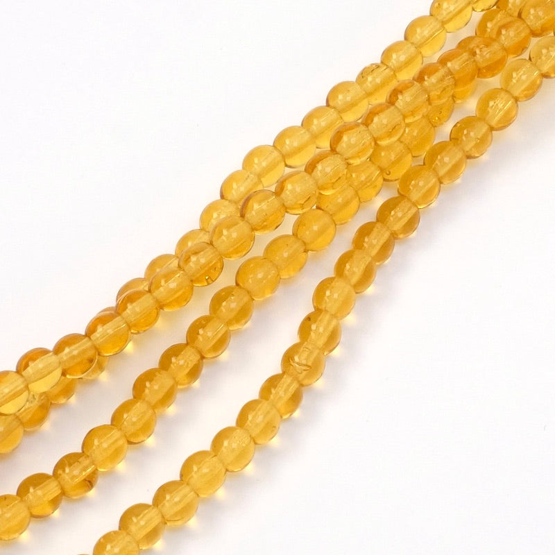 Fil de perles de Bohème rondes 4mm ambre transparent